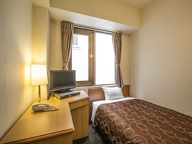 Imagen de la habitación del Hotel New Okinawa. Foto 14