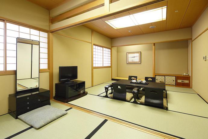 Imagen de la habitación del Hotel New Omi. Foto 5