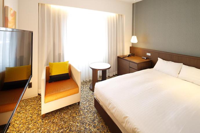 Imagen de la habitación del Hotel New Omi. Foto 8