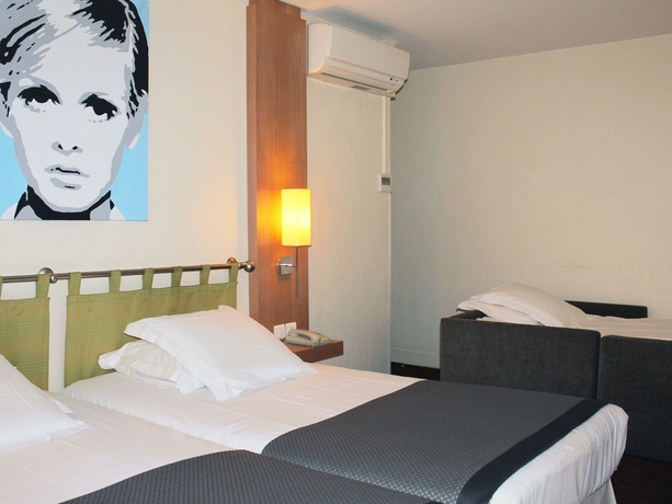 Imagen de la habitación del Hotel New Opera. Foto 13