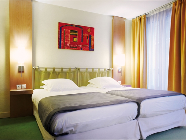 Imagen de la habitación del Hotel New Opera. Foto 14