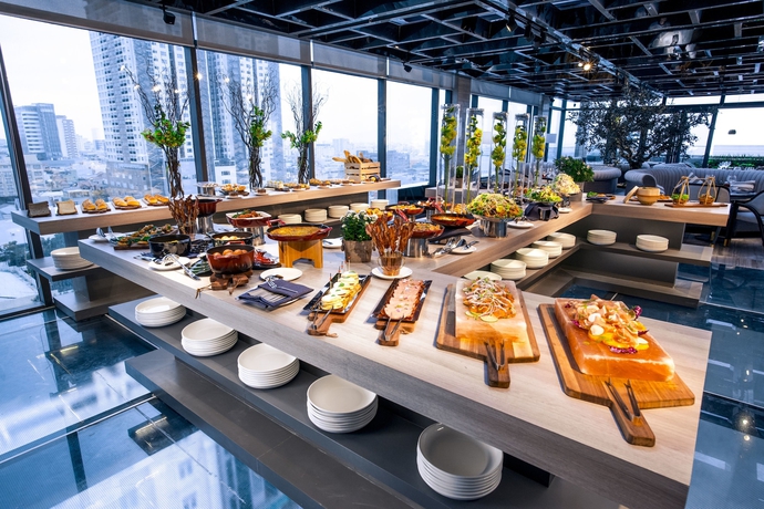 Imagen del bar/restaurante del Hotel New Orient Danang. Foto 8