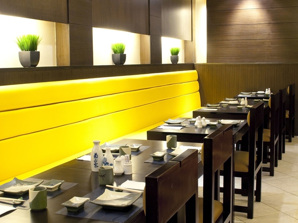 Imagen del bar/restaurante del Hotel New Orient Landmark. Foto 2
