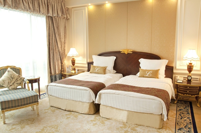 Imagen de la habitación del Hotel New Orient Landmark. Foto 7