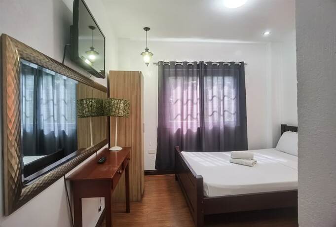 Imagen de la habitación del Hotel New Orleans Tagaytay. Foto 17