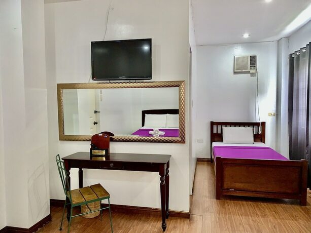 Imagen de la habitación del Hotel New Orleans Tagaytay. Foto 20