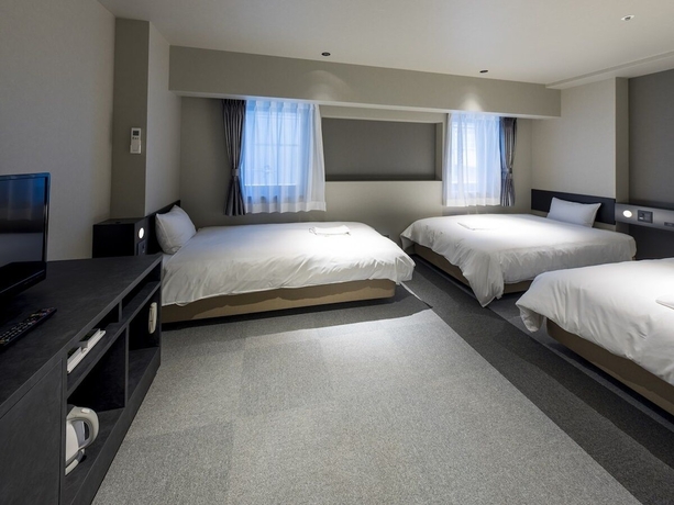 Imagen de la habitación del Hotel New Osaka. Foto 2