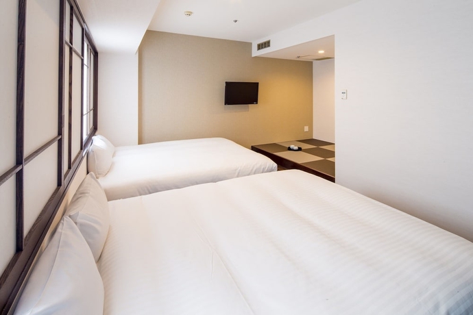 Imagen de la habitación del Hotel New Osaka. Foto 9