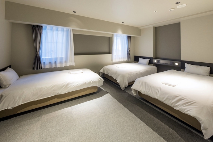 Imagen de la habitación del Hotel New Osaka. Foto 11