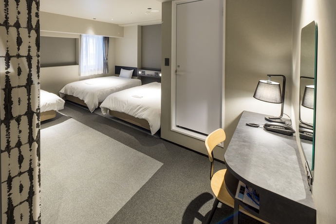 Imagen de la habitación del Hotel New Osaka. Foto 12