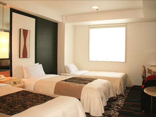 Imagen de la habitación del Hotel New Otani Inn Tokyo. Foto 8