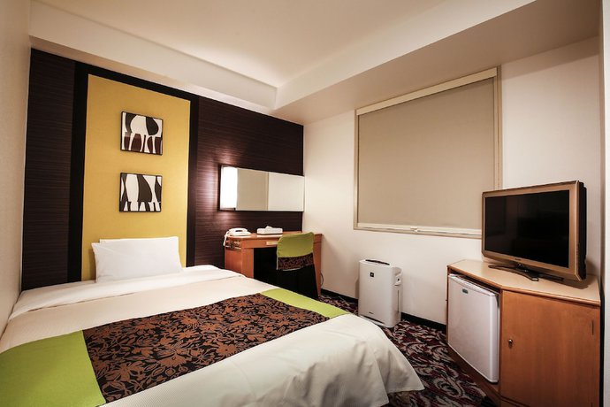 Imagen de la habitación del Hotel New Otani Inn Tokyo. Foto 9