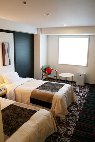 Imagen de la habitación del Hotel New Otani Inn Tokyo. Foto 10