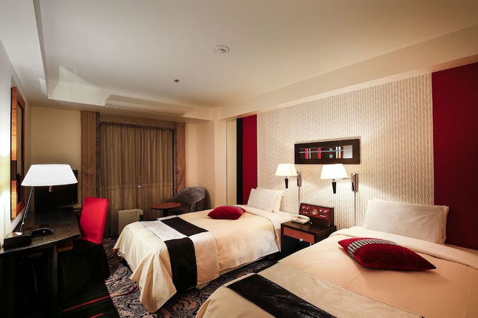 Imagen de la habitación del Hotel New Otani Inn Tokyo. Foto 11