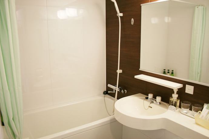 Imagen de la habitación del Hotel New Otani Inn Tokyo. Foto 13