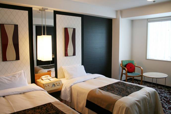 Imagen de la habitación del Hotel New Otani Inn Tokyo. Foto 16