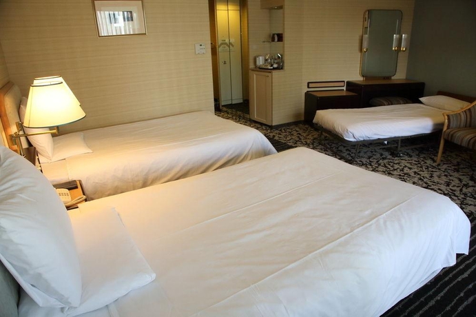 Imagen de la habitación del Hotel New Otani Osaka. Foto 7