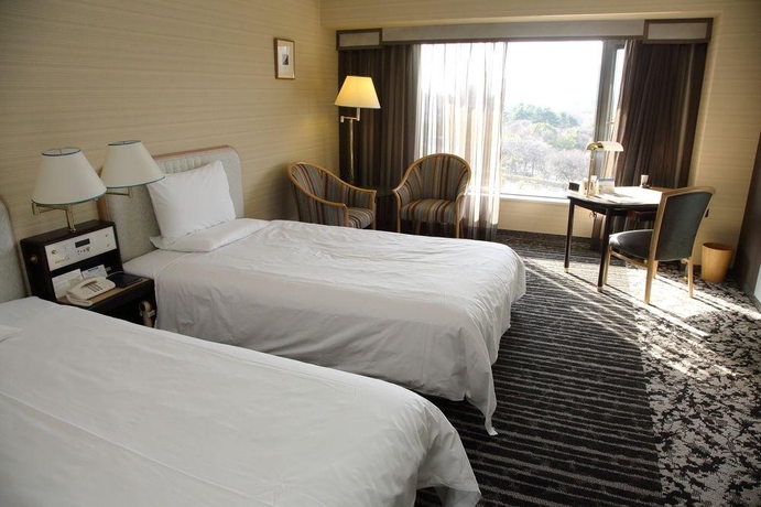 Imagen de la habitación del Hotel New Otani Osaka. Foto 8