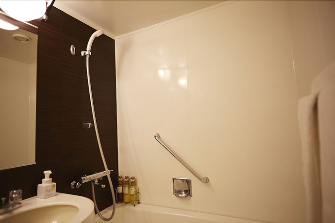 Imagen de la habitación del Hotel New Otani Takaoka. Foto 11