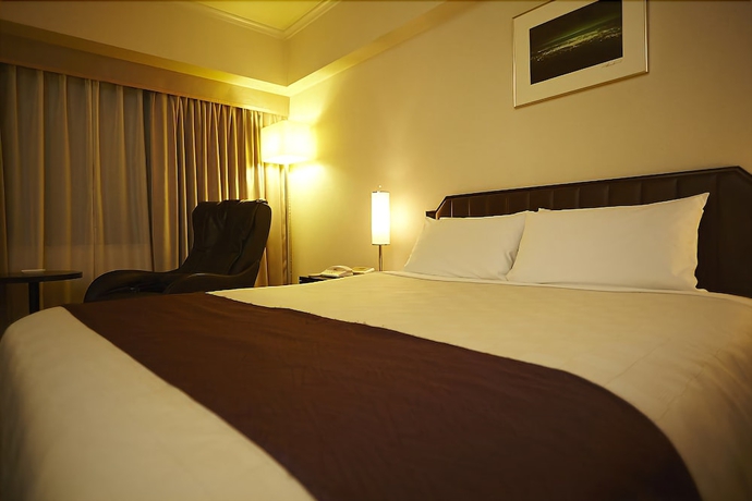 Imagen de la habitación del Hotel New Otani Takaoka. Foto 14