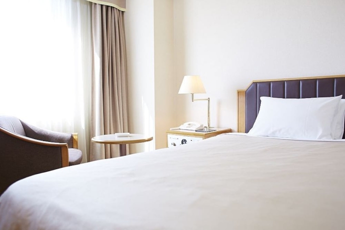 Imagen de la habitación del Hotel New Otani Takaoka. Foto 15