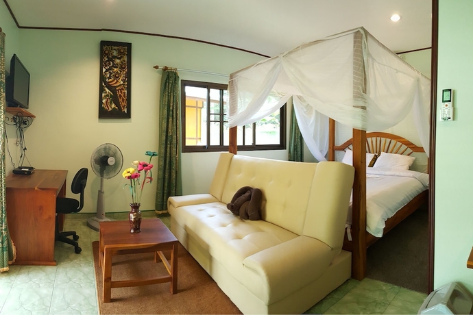 Imagen de la habitación del Hotel New Paradise Home Resort. Foto 7