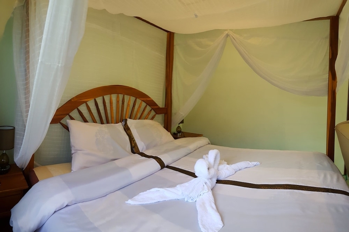 Imagen de la habitación del Hotel New Paradise Home Resort. Foto 8