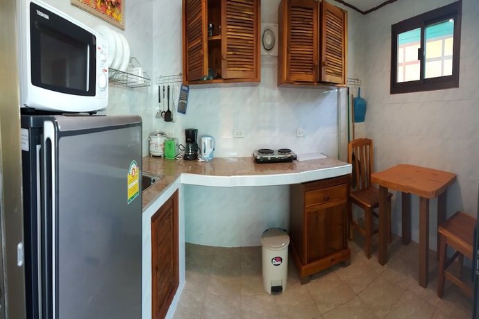 Imagen de la habitación del Hotel New Paradise Home Resort. Foto 11