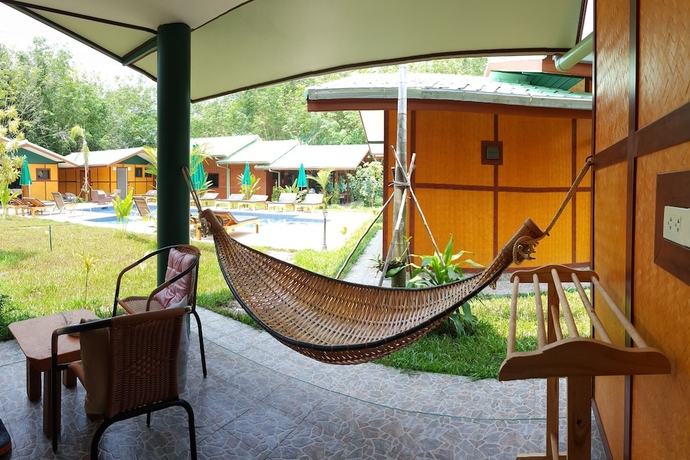 Imagen de la habitación del Hotel New Paradise Home Resort. Foto 13