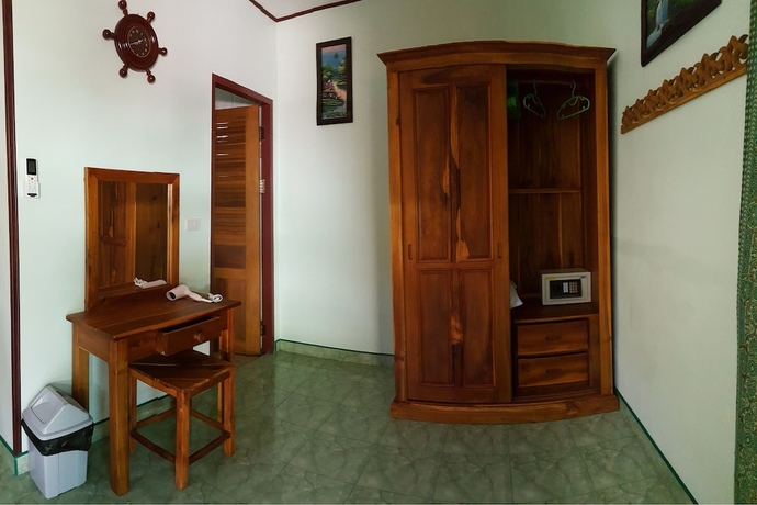 Imagen de la habitación del Hotel New Paradise Home Resort. Foto 15