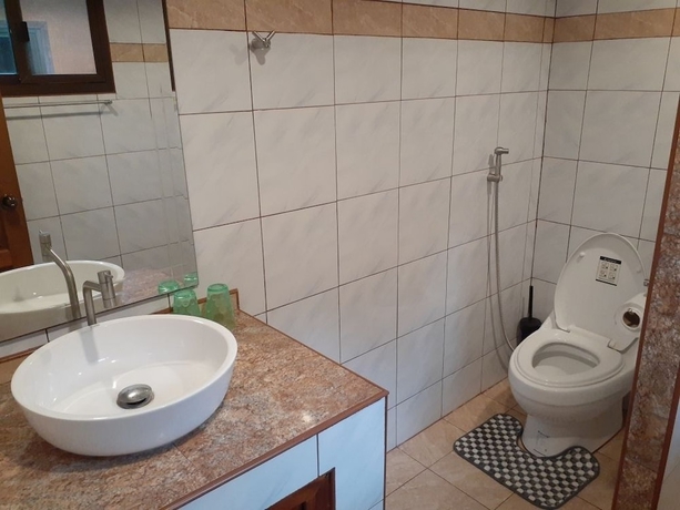 Imagen de la habitación del Hotel New Paradise Home Resort. Foto 18