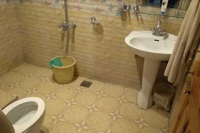 Imagen de la habitación del Hotel New Park and Restaurant. Foto 8