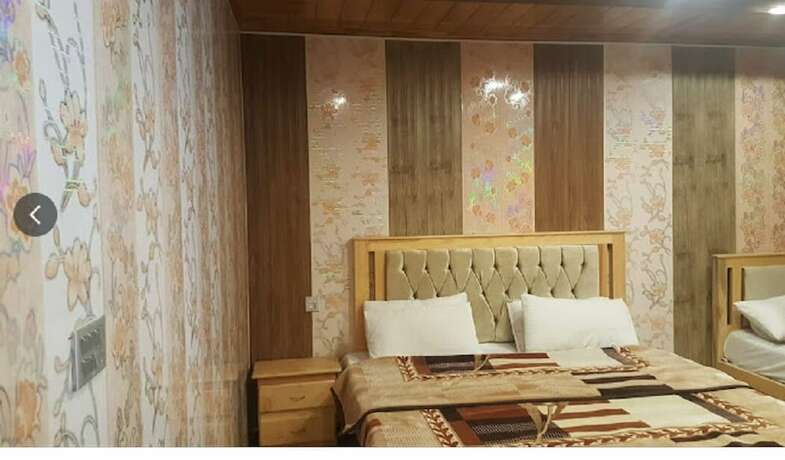 Imagen de la habitación del Hotel New Park and Restaurant. Foto 10