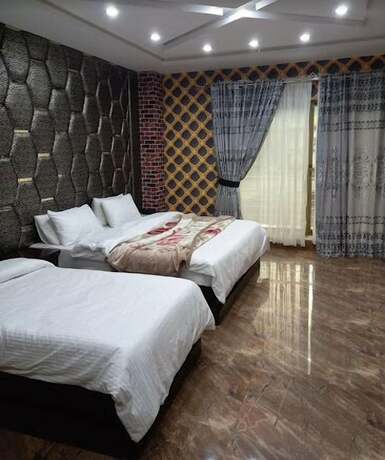 Imagen de la habitación del Hotel New Park and Restaurant. Foto 11