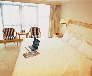 Imagen de la habitación del Hotel New Pearl River. Foto 14