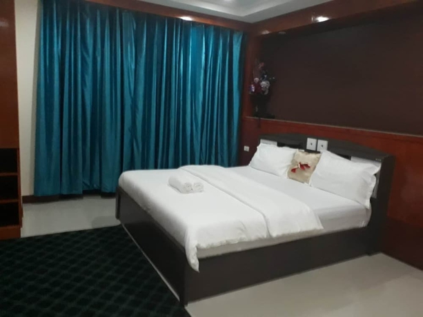 Imagen de la habitación del Hotel New Pind Balluchi Inn. Foto 11