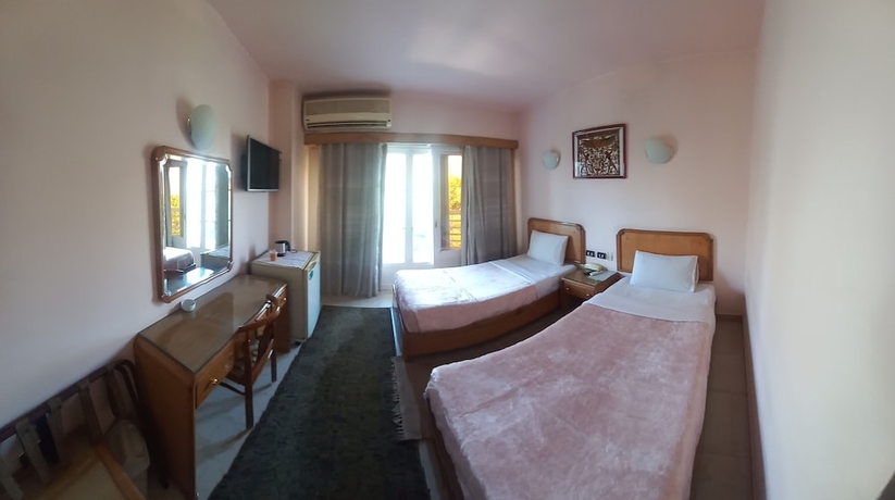 Imagen de la habitación del Hotel New Pola. Foto 3