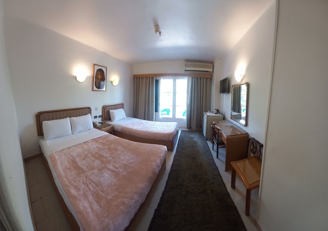 Imagen de la habitación del Hotel New Pola. Foto 8
