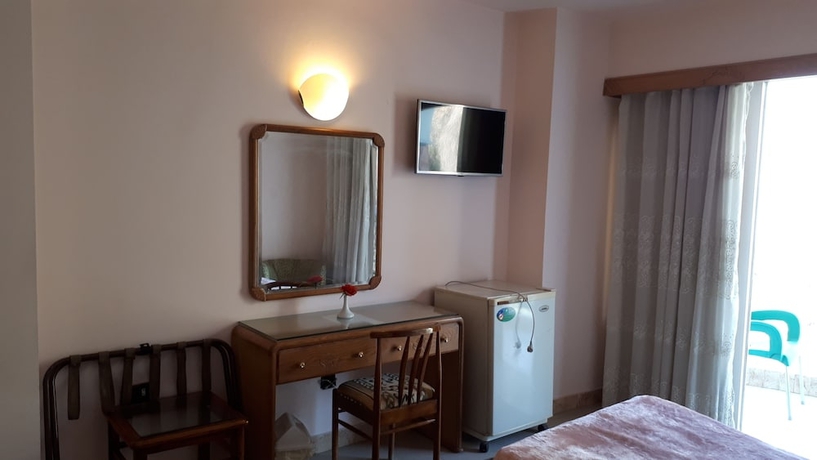 Imagen de la habitación del Hotel New Pola. Foto 12