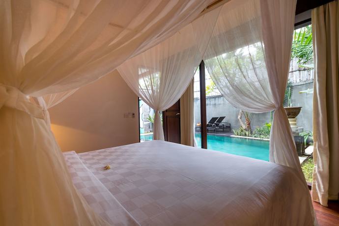 Imagen de la habitación del Hotel New Pondok Sara Villas. Foto 14