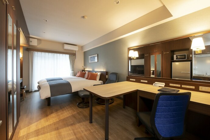 Imagen de la habitación del Hotel New Port Yokosuka. Foto 11