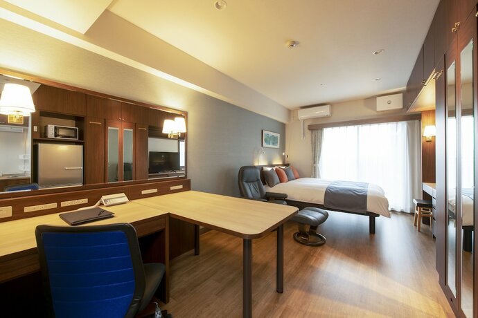 Imagen de la habitación del Hotel New Port Yokosuka. Foto 13