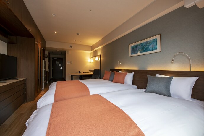 Imagen de la habitación del Hotel New Port Yokosuka. Foto 14