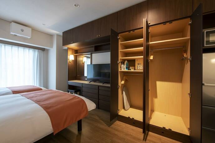 Imagen de la habitación del Hotel New Port Yokosuka. Foto 15