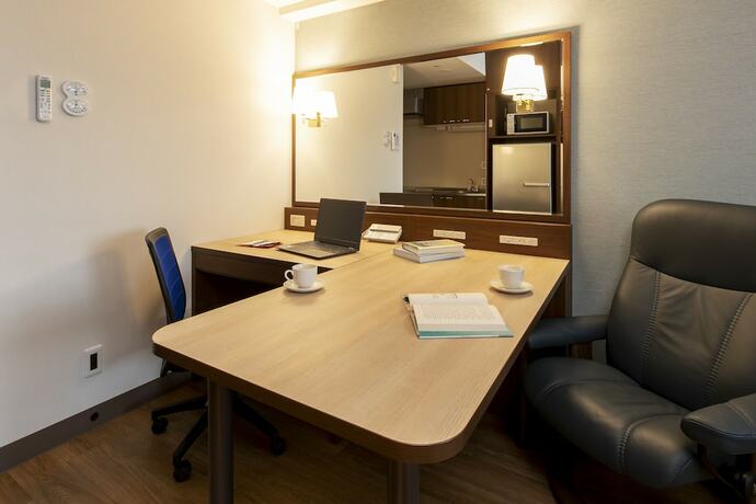 Imagen de la habitación del Hotel New Port Yokosuka. Foto 17