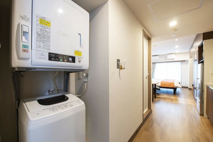 Imagen de la habitación del Hotel New Port Yokosuka. Foto 18