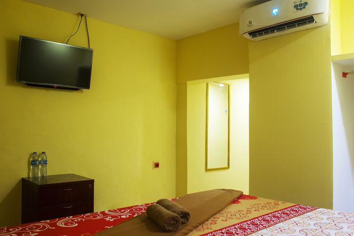 Imagen de la habitación del Hotel New Priok Indah. Foto 15