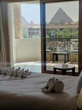 Imagen de la habitación del Hotel New Regency Pyramids View. Foto 20