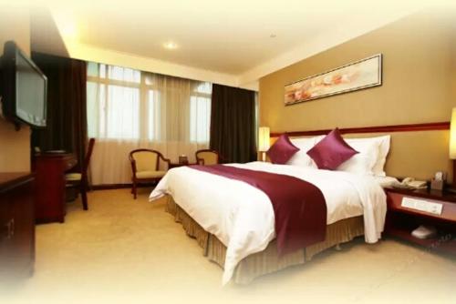 Imagen de la habitación del Hotel New Regent Huizhou. Foto 4