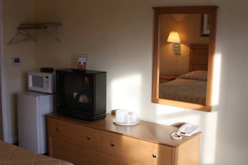 Imagen de la habitación del Hotel New Relax Inn. Foto 3